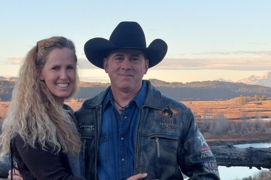 jesse and valerie walden in front of grand teton mountains-diamond w ranch
