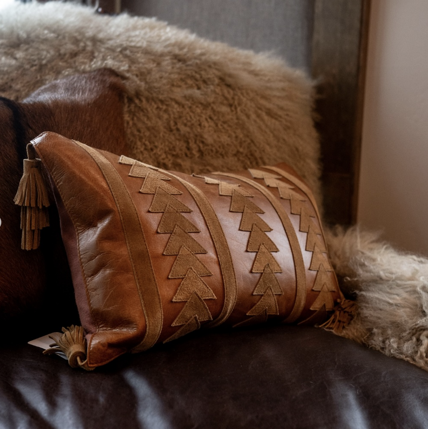 paseo road's arrow tassel leather western lumbar pillow