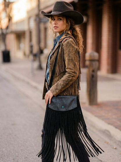 Ondina Fringe black Italian leather fringe bag with turquoise closure worn with fringe jacket, Diamond W Ranch
