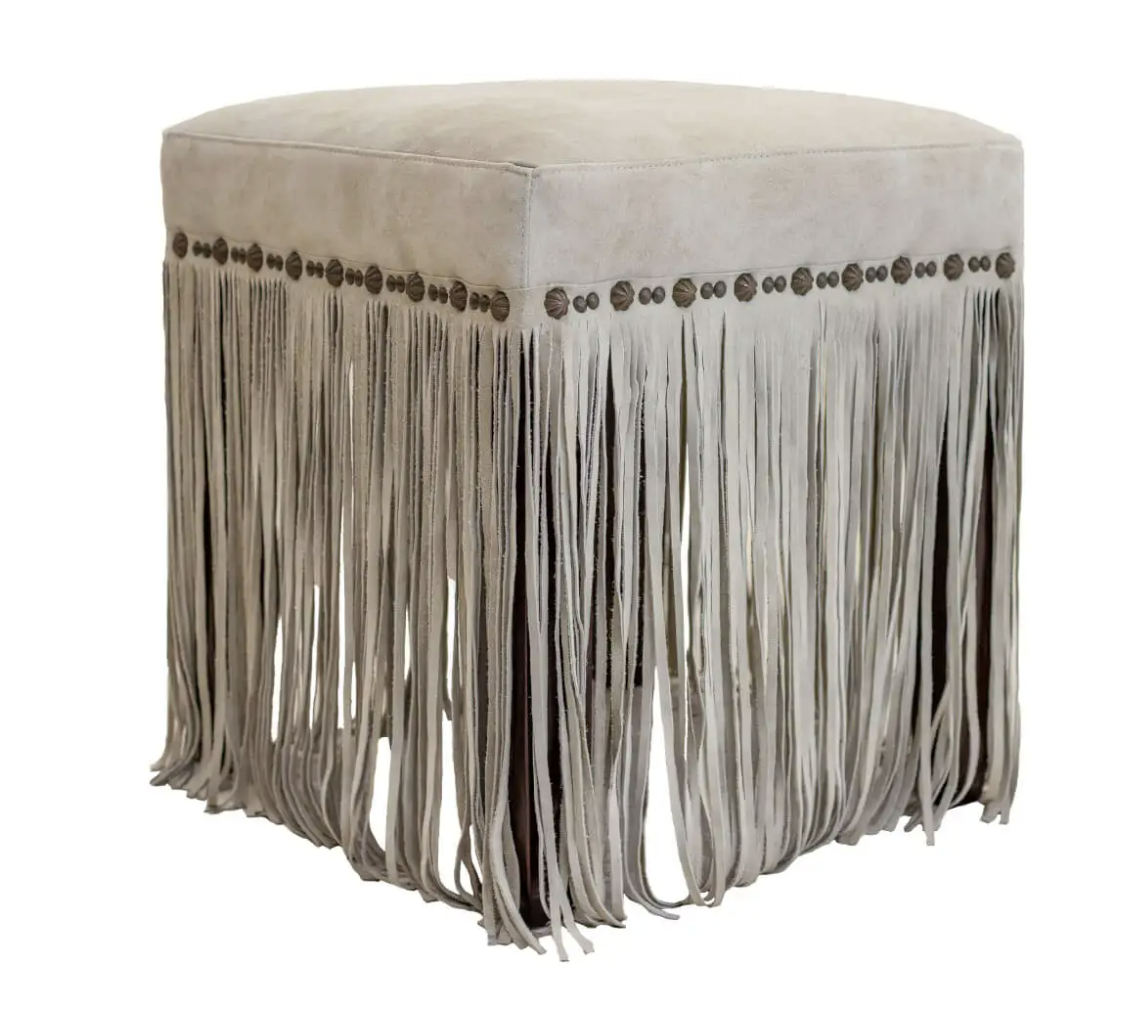 square fringed ottoman in pale gray suede with custom clavos